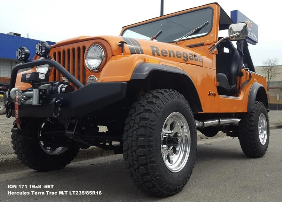 Orange Jeep with Renegade graphics at Tire Capital in Prince George. Fitted: ION 171 16x8 -5ET; Hercules Terra Trac M/T LT235/85R16