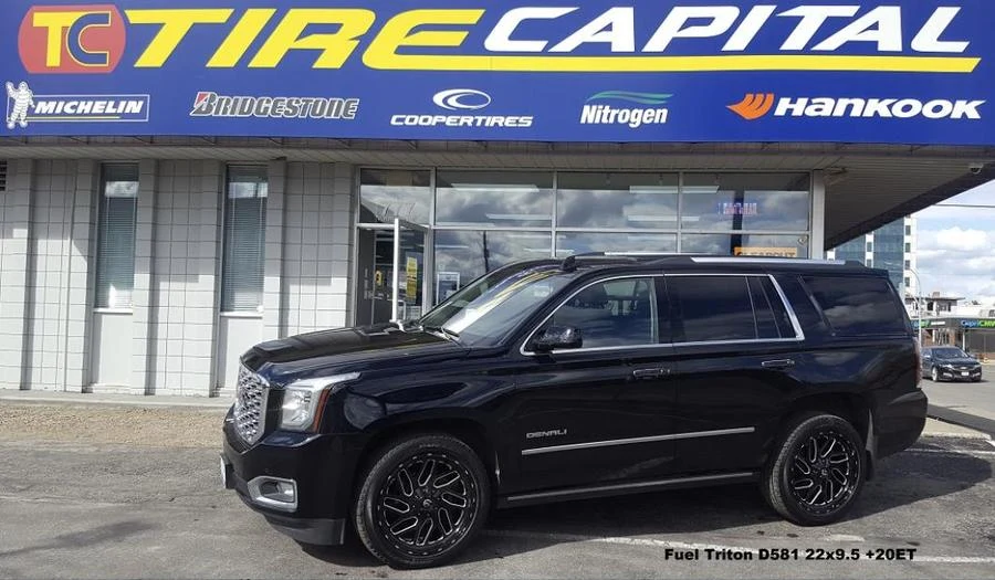 Black GMC Denali SUV at Tire Capital in Prince George. Fitted: Fuel Triton D581 22x9.5 +20ET
